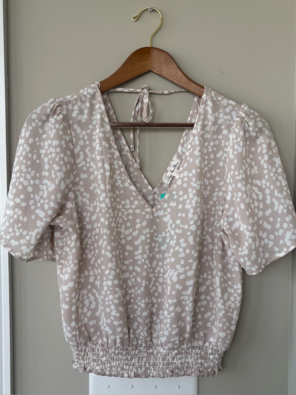 Nine Britton Cidro smocked bottom blouse size small NWT
